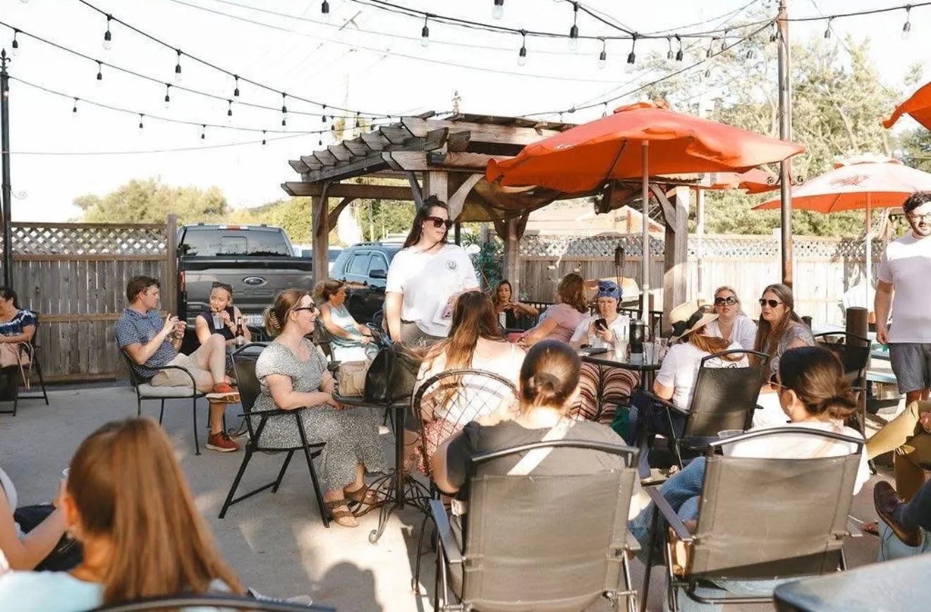 Guests filling a patio at a chamber event